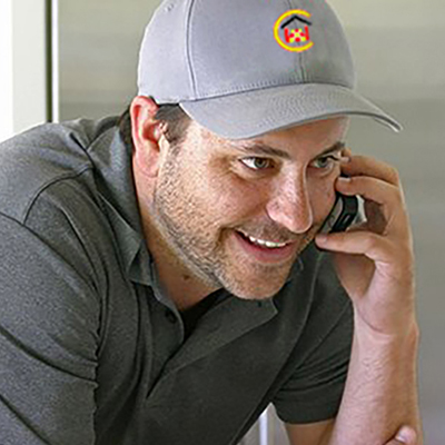 On the phone with a roofing contractor